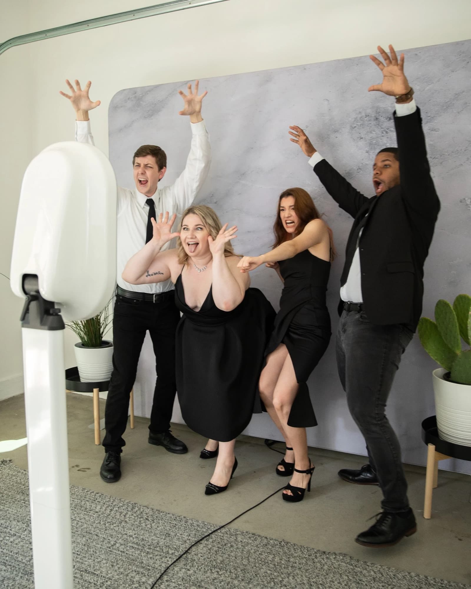 A group mid-pose at the Lyric social booth